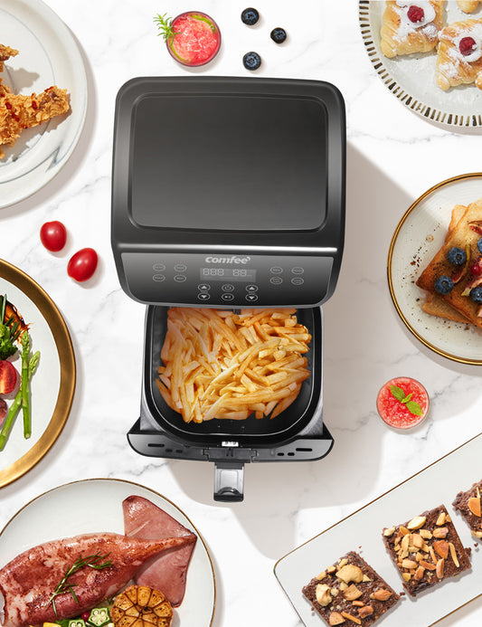 digital air fryer with fries inside surrounded by various cooked meals