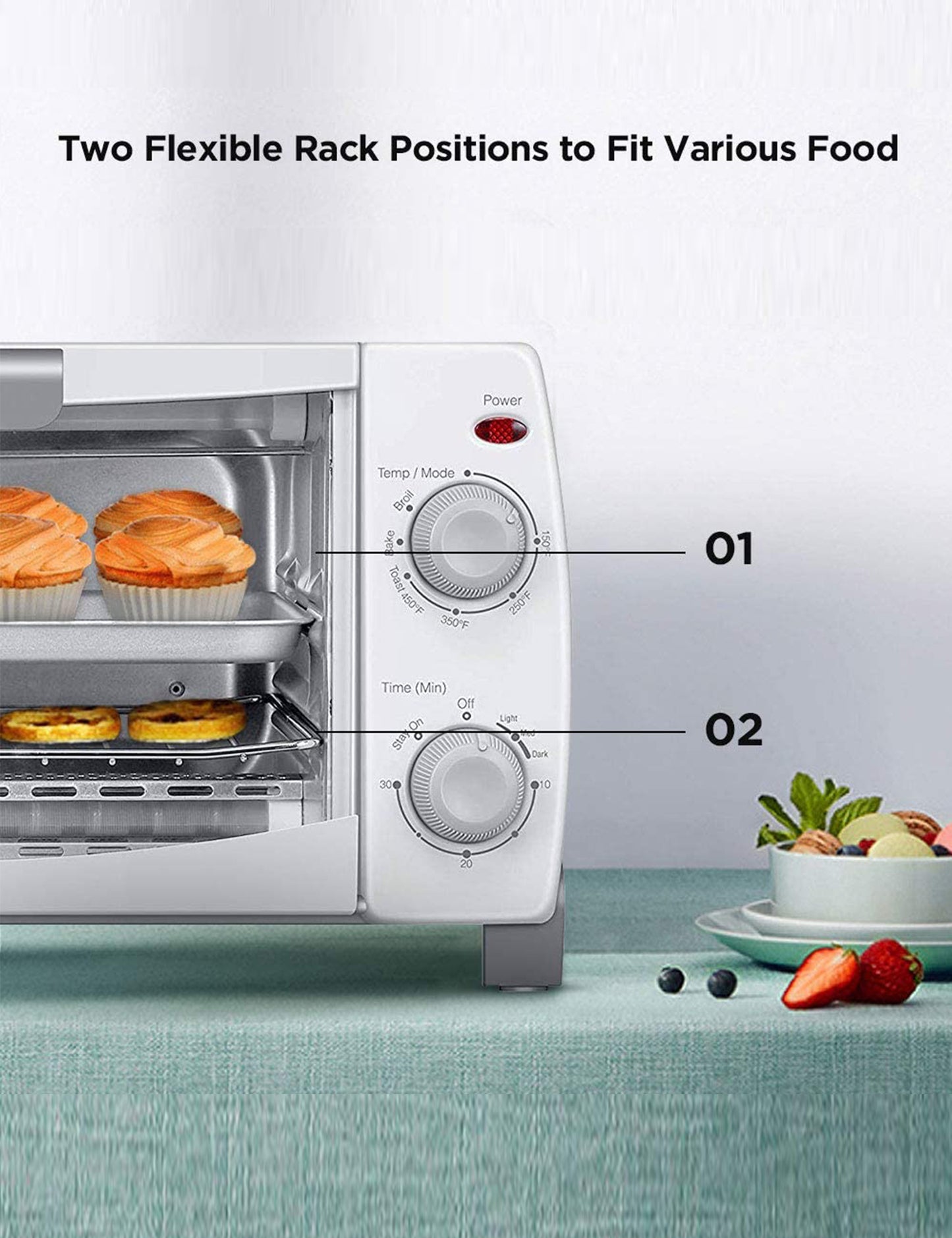 white toaster oven with cupcakes inside