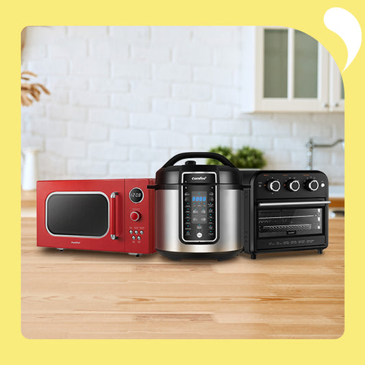 an air fryer, microwave oven and rice cooker on the table