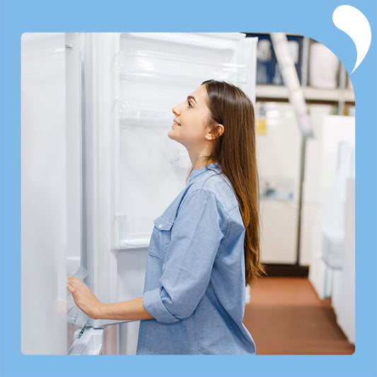 The young woman stood in front of the open refrigerator to check it out.