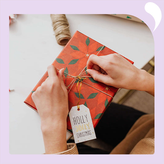 Someone is packing Christmas presents