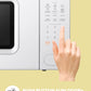 someone wants to touch the display panel of comfee retro microwave oven