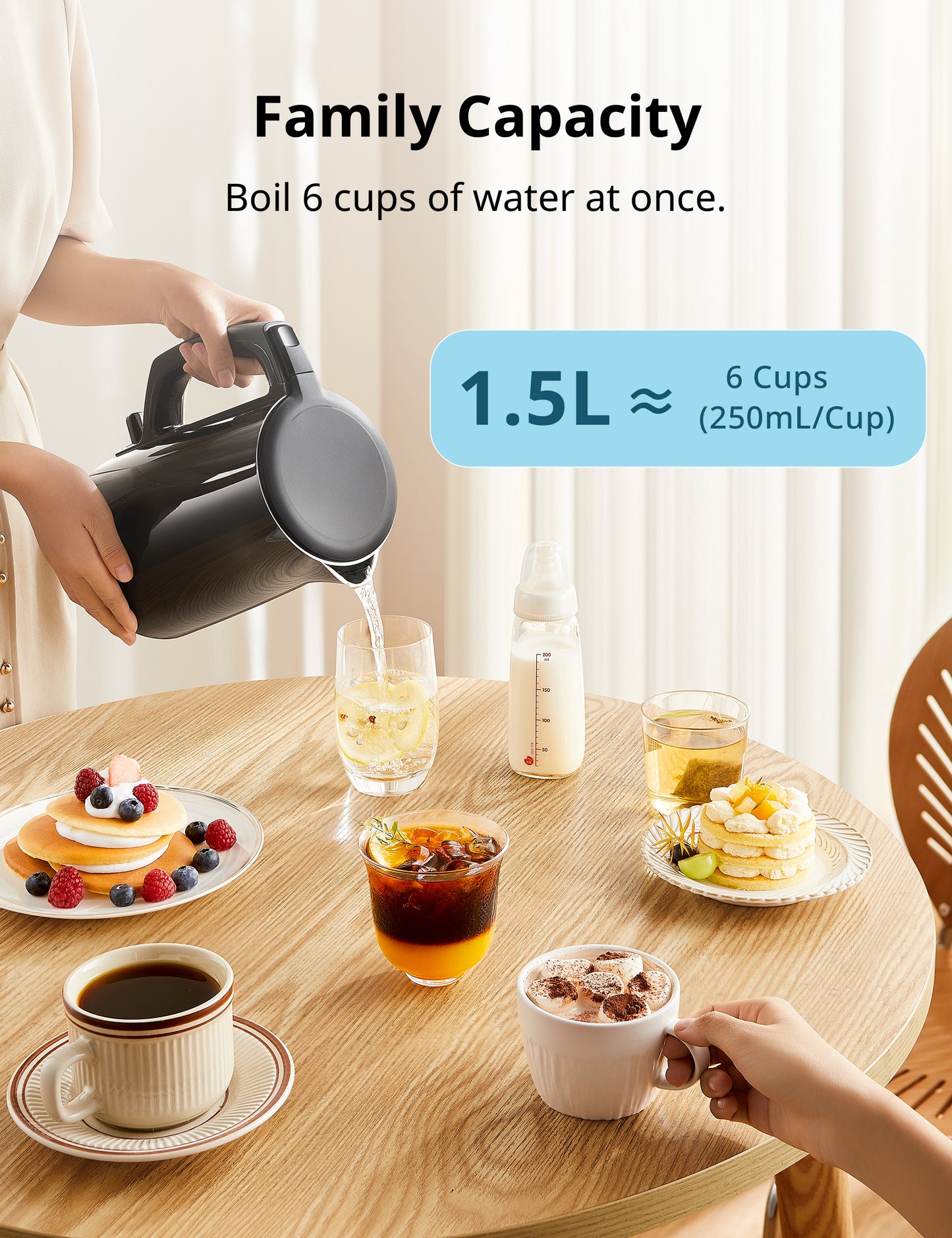 Someone uses an electric kettle to pour water for multiple cups, highlighting family-sized capacity.