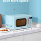 size dimensions of pastel green microwave oven sitting on a table next to chicken in a plate