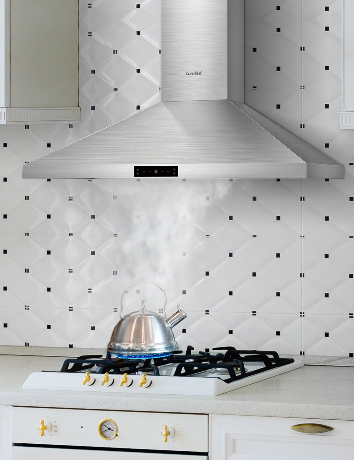wall mount ducted range hood sucking smoke from a boiling pot on a oven