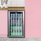 silver undercounter beverage cooler in a pink kitchen