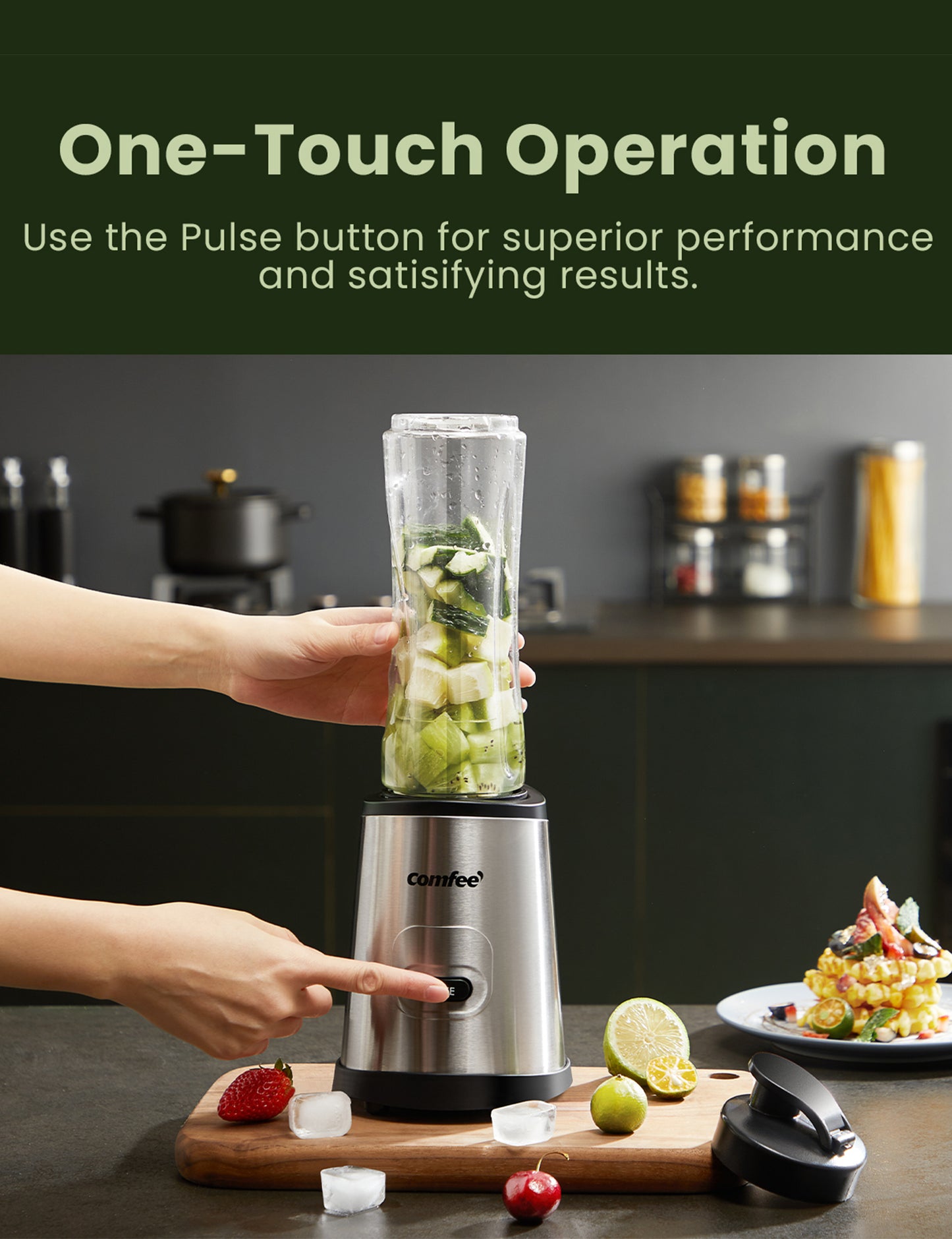 hand pressing button on personal blender with green vegetables inside