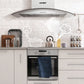 wall mount comfee curved glass range hood in a modern white kitchen