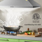 stainless steel ducted range hood taking in smoke from a pot cooking food on a stove