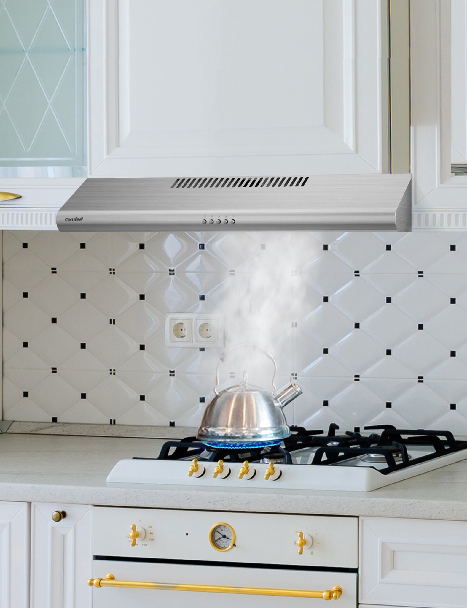 comfee ductless under cabinet filtering smoke from a teapot on stovetop
