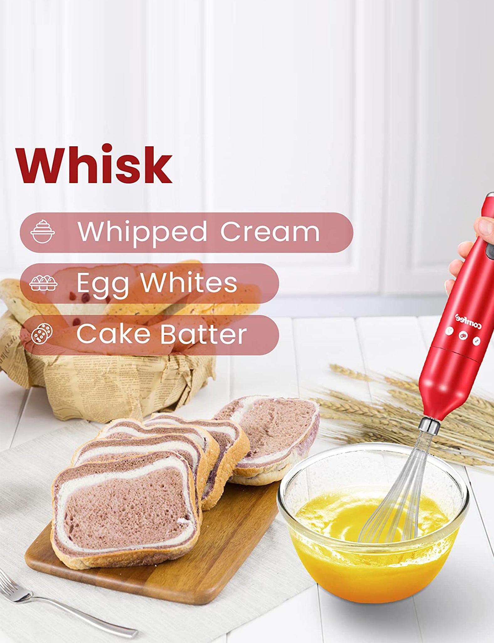 hand whisking eggs with a electric hand blender