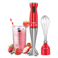 red comfee electric hand blender next to a cup of tomato juice and a whisk head