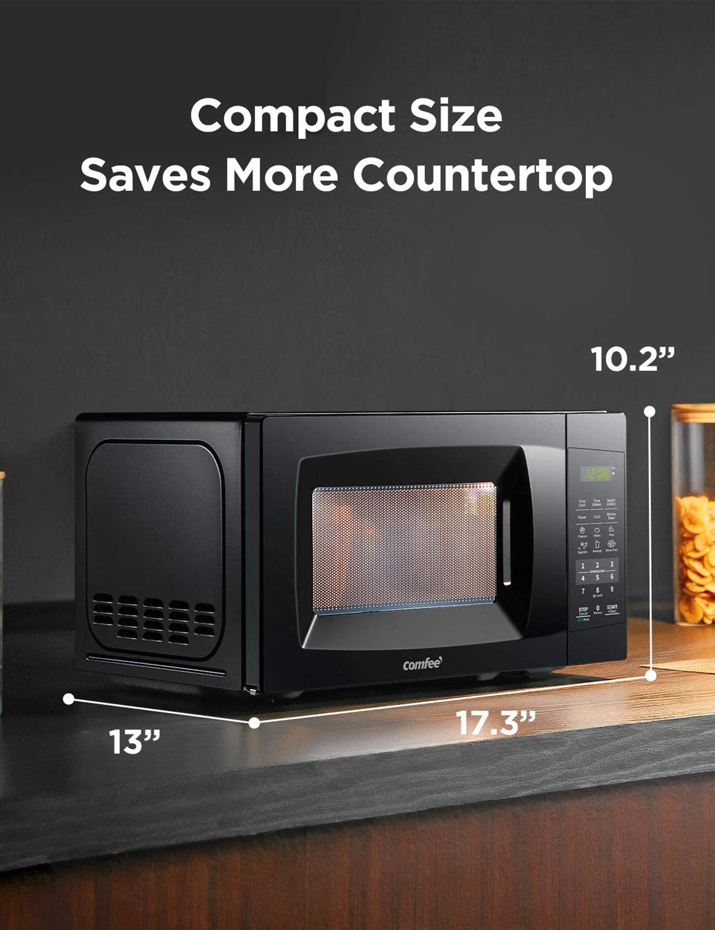 size dimensions of black comfee compact microwave oven on a black kitchen countertop