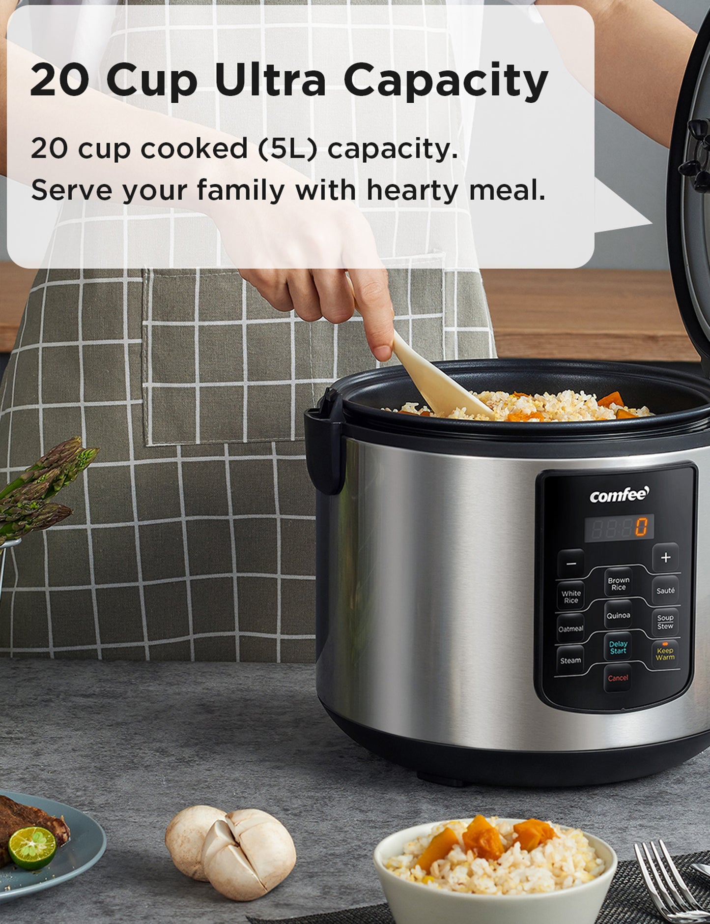 woman cooking rice in a electric rice cooker