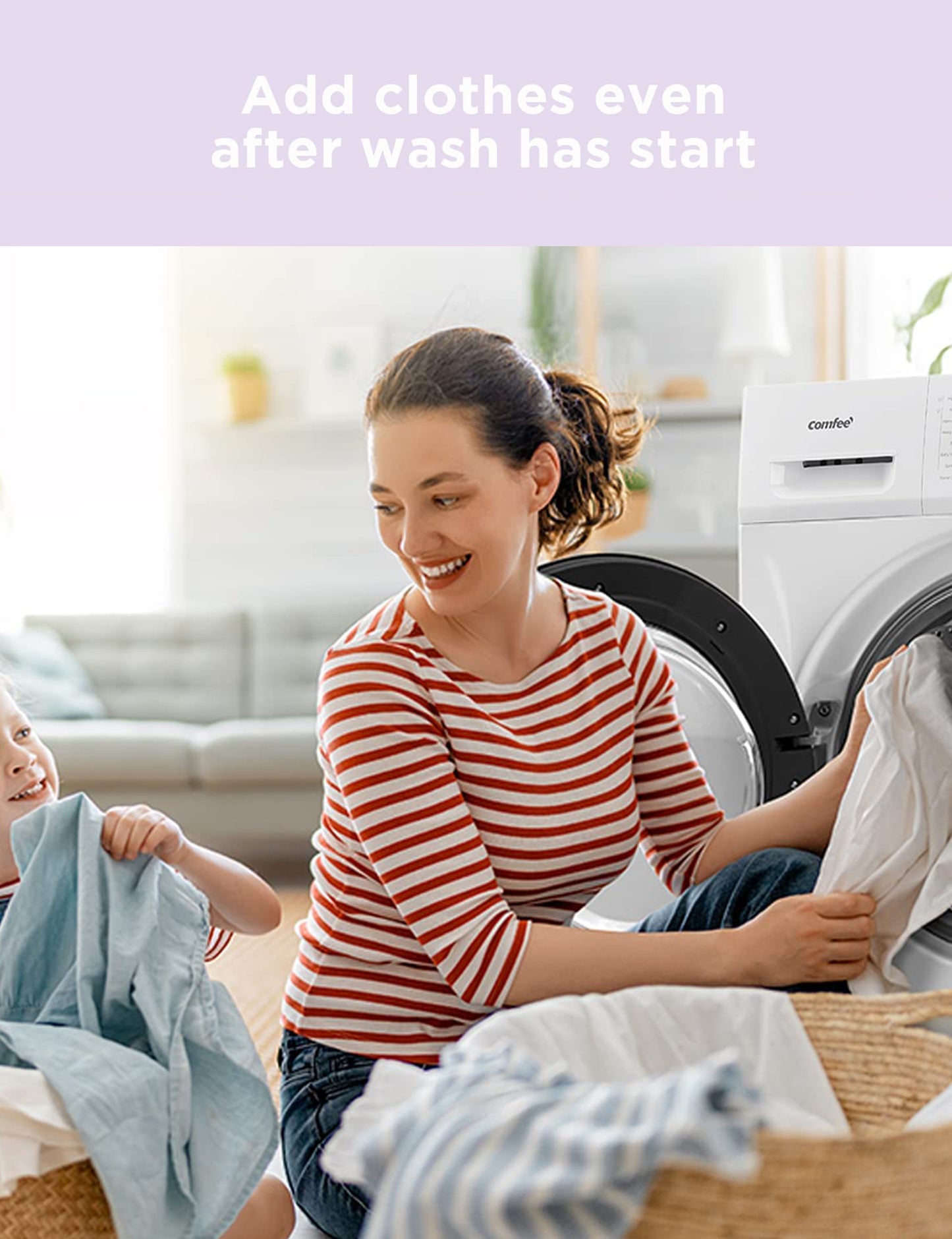 A woman smiles and takes clothes out of the comfee washing machine