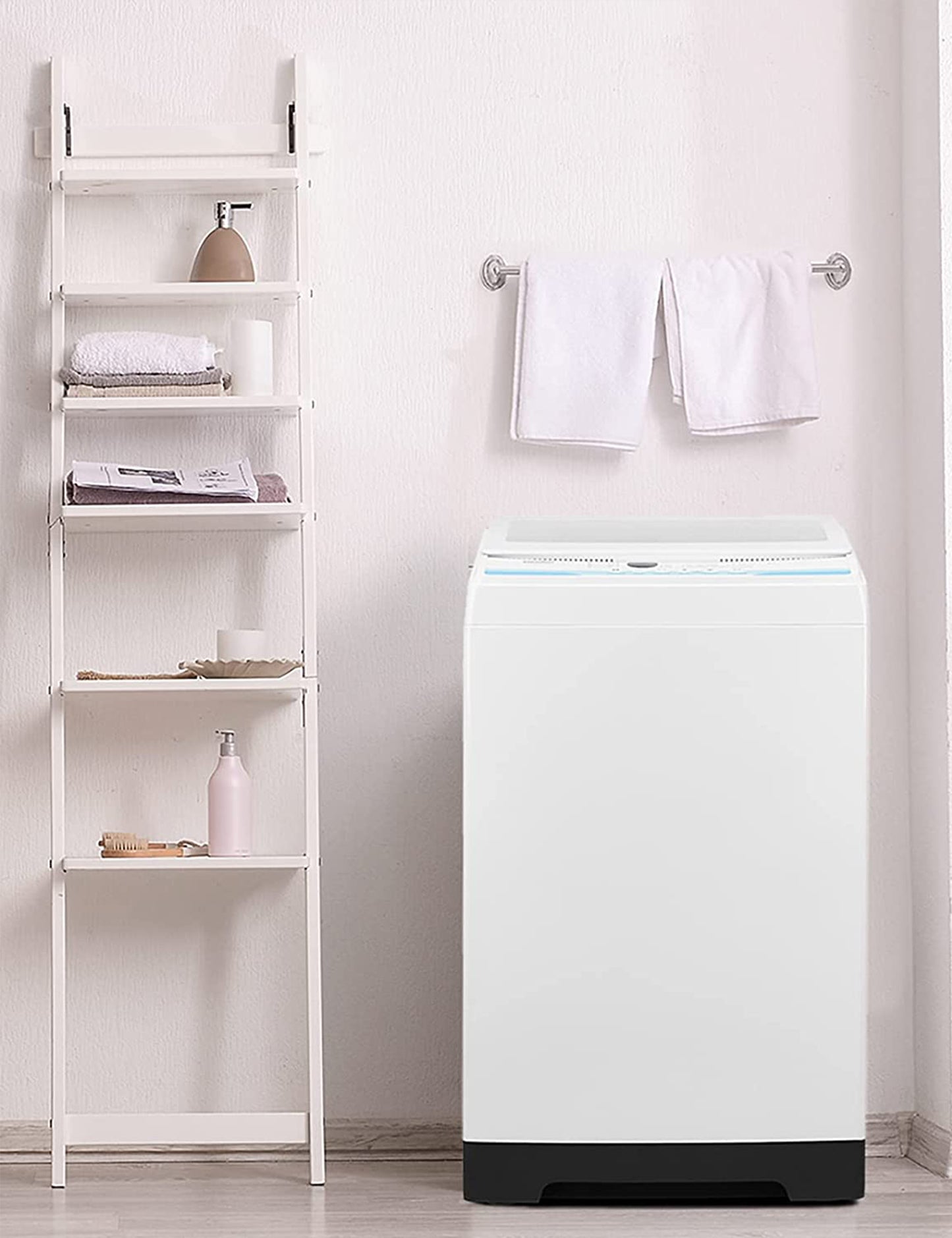 white portable comfee washing machine in a utility room
